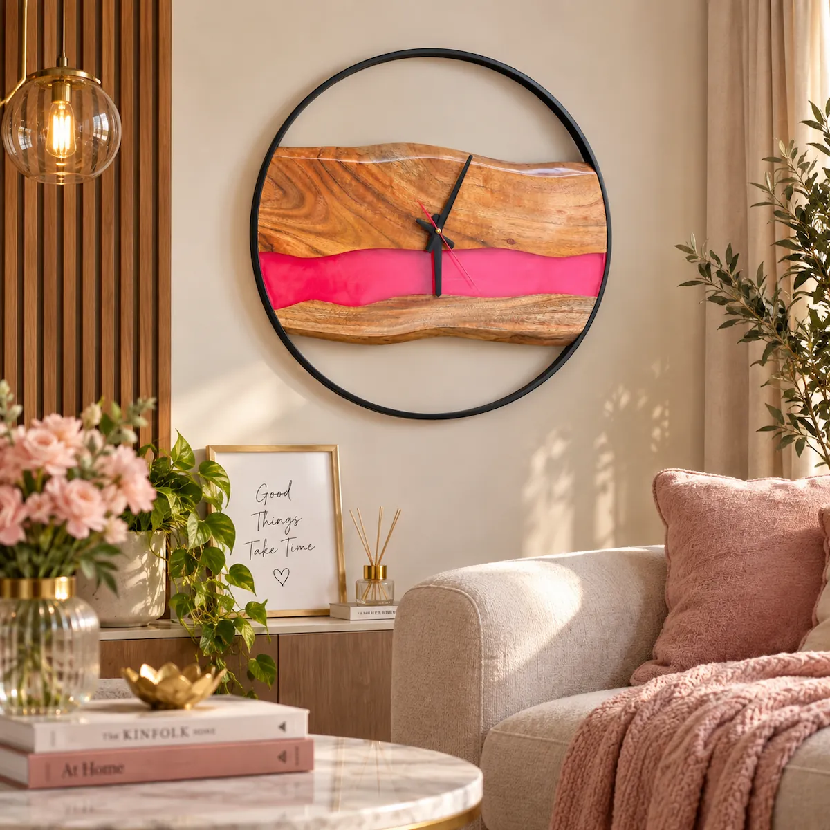 pink epoxy resin wall clock Pink Epoxy Resin Wall Clock with black round frame hanging on a living room wall